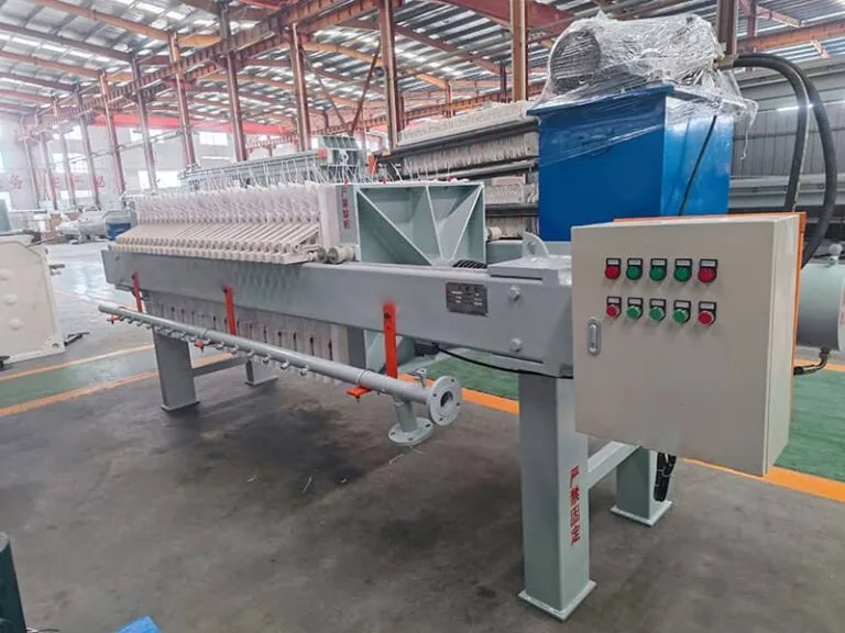 Industrial filter press with a plate pack and control panel